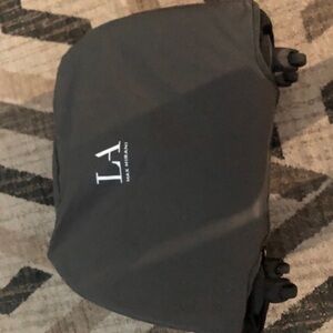 MAX MIRANI
Luggage Move Mobile Closet, Brilliant Black